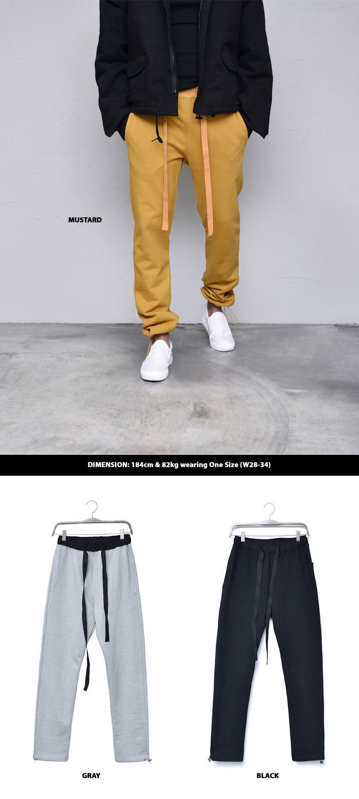 black sweatpants with white strings